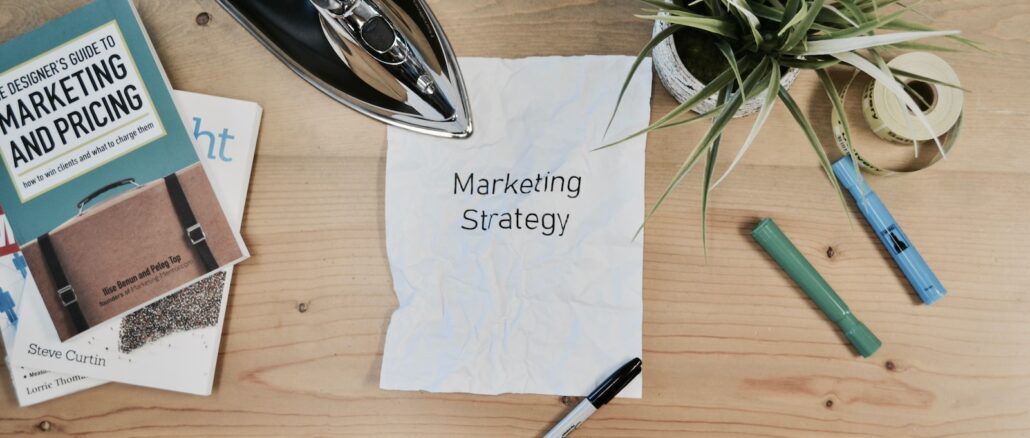 white printing paper with Marketing Strategy text